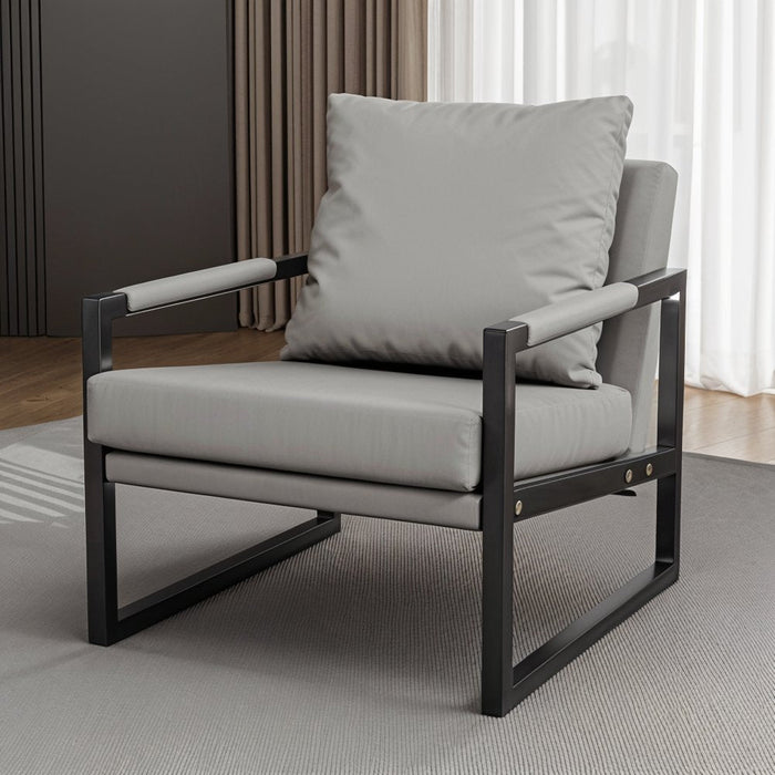 Kraesio Arm Chair - Residence SupplyElevate your living room ambiance with the Kraesio Arm Chair's sophisticated charm, creating a stylish and inviting atmosphere for you and your guests.